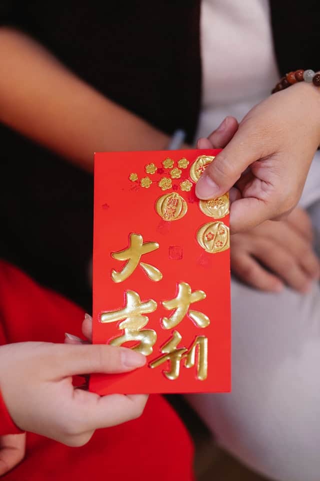 Red Envelope Exchange by Angela Roma from Pexels