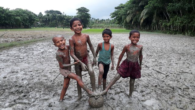 Children playing in mud by Pexels